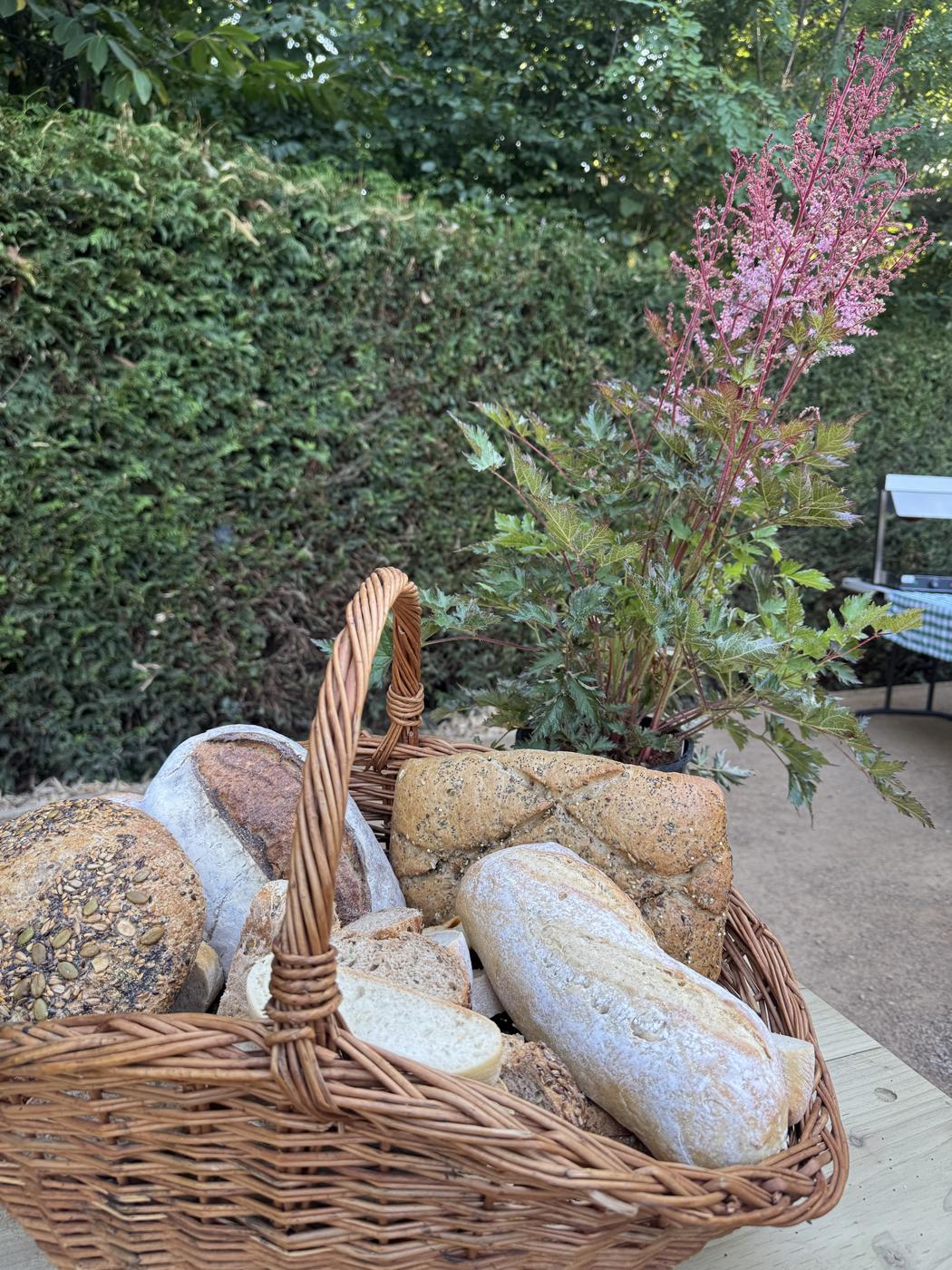 Basket of artisan breads on a private dining table